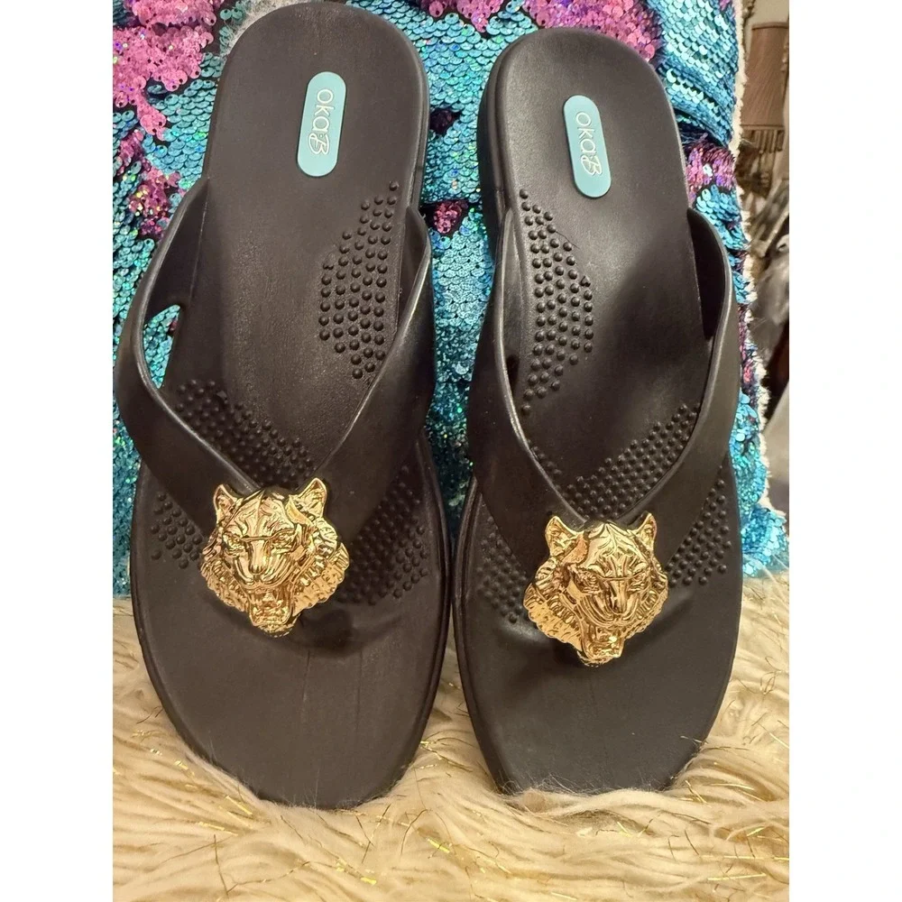 New Okab Black Licorice Gold Lion Head Rubber Flip Flop Thong Sandals Womens M/L